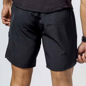 Men's <b>Black</b> Solid Quick Dry Breathable Sport Shorts Elastic Waist Knee Length Nonwoven Polyester Front Logo Drawstring Closure - Product Image 2