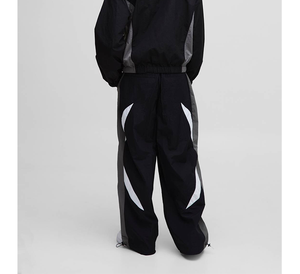 Pantalones de chándal de nailon ligeros con logo personalizado para hombre, estilo urbano con bloques de color, pantalones de entrenamiento al por mayor, pantalones de hombre lavados - Product Image 6