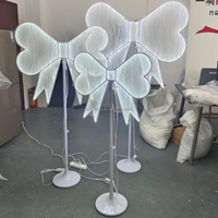 2024 Ailes de papillon de lumière d'arc de décoration de mariage de style Offre Spéciale de LED
