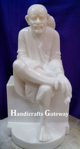 Statue de Lord Sai Baba en marbre blanc fait main, au design étonnant, finition soignée et polie, pour la maison, le bureau et les temples. - Product Image 3