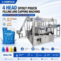 Machine de remplissage de sachets souples pour liquides de nettoyage ménager, savon liquide, détergent, colle, revêtement à base d'eau et peinture, à 4 têtes