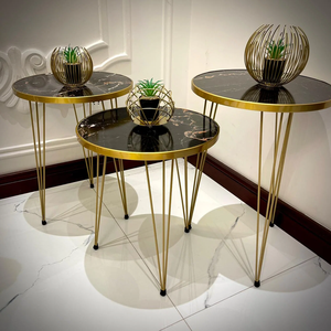 Ensemble de tables d'appoint rondes de luxe en métal doré et marbre noir pour salon - Product Image 4