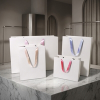 Sac en papier de luxe translucide imprimé sur mesure en fibre végétale, fait main, pour l'emballage de produits de soin bio, de bijoux et de montres
