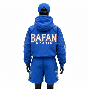 Ensemble court coupe-vent léger pour homme en nylon et polyester, tissu lisse, look à empiècements contrastants avec logo brodé personnalisé - Product Image 2