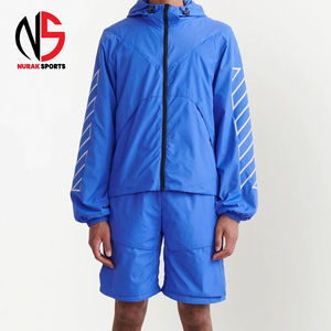 Ensemble de survêtement décontracté personnalisable deux pièces pour homme, avec veste coupe-vent en nylon à fermeture éclair, idéal pour l'hiver, chez NURAK en 2026 - Product Image 1