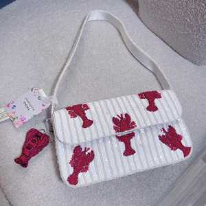 กระเป๋าถือทรงสี่เหลี่ยมผ้าฝ้ายปักลายกุ้งมังกรทำมือจากอินเดีย - Product Image 1