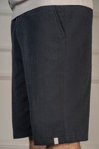 Pantalones Cortos Bermuda de Algodón Tejido de Color Liso para Hombre 2026 con Bolsillos, Cintura Elástica, Estilo Casual, Tiro Medio - Product Image 5