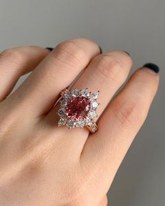 Anillo de compromiso de oro macizo de 14k con circonita cúbica de corte ovalado y halo de diamantes rosas, estilo vintage, joyería de moda - Product Image 1