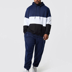Ensemble de survêtement homme hiver personnalisé avec patchs imprimés effet vieilli, comprenant un sweat à capuche et un pantalon, style délavé à l'acide et color block - Product Image 1
