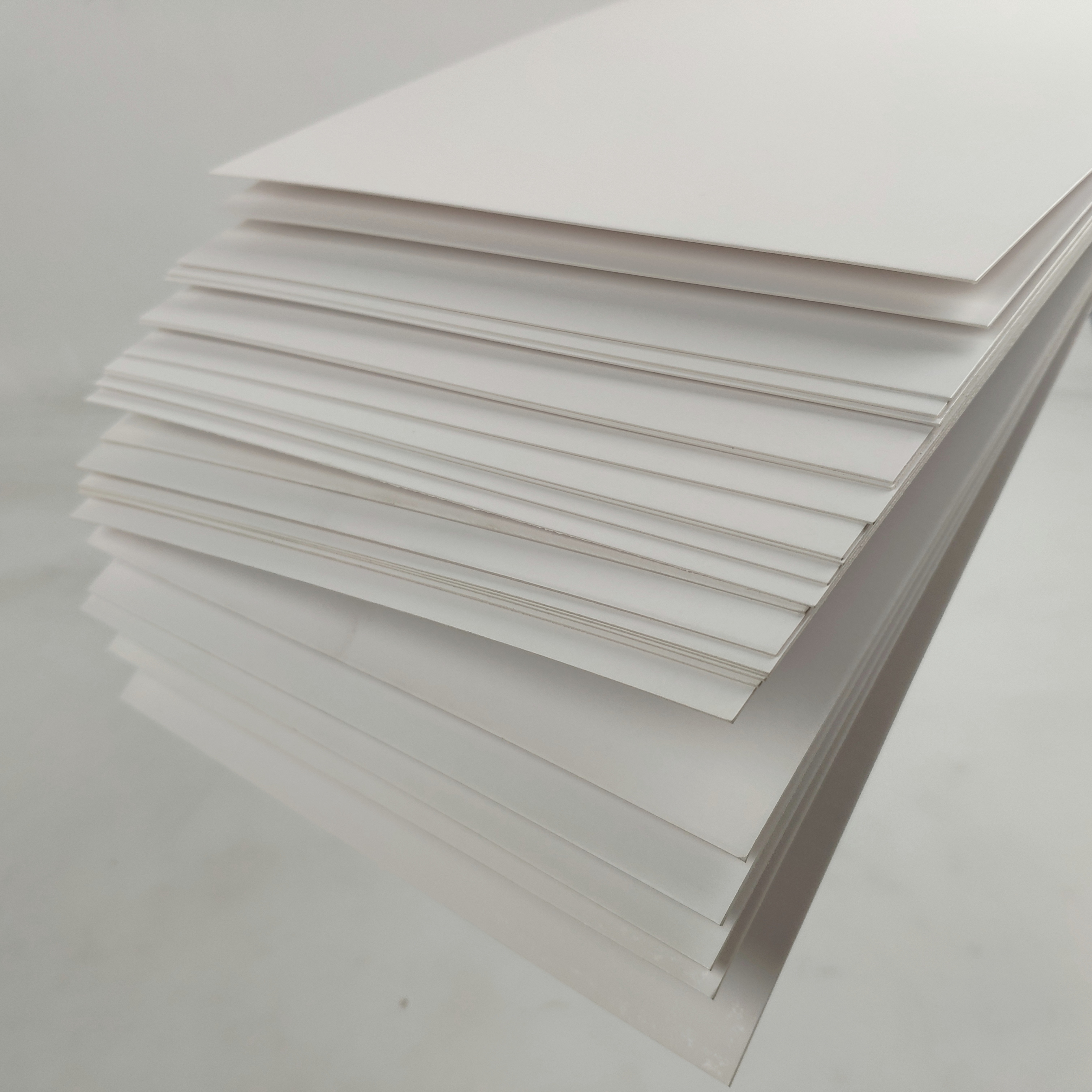 China Top Quality C2s Gloss/matte Art Printing Card Board Paper Carton in Roll Specialty Paper