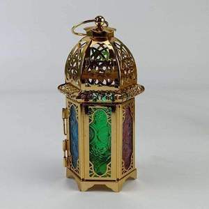 Refined iron lantern suitable for decorative lighting arrangements during festive occasions and stylish home gatherings - Product Image 6