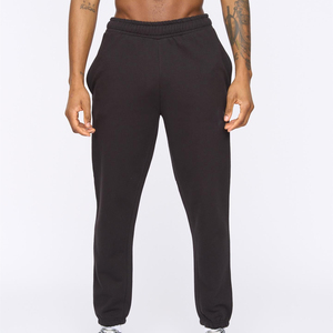 Pantalon de survêtement en coton noir pour homme, taille élastique, décontracté, avec poches latérales, tissu tricoté de poids moyen - Product Image 1