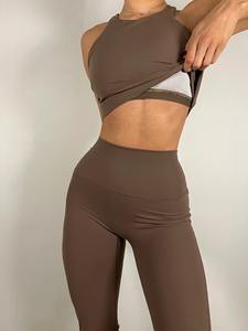 เสื้อกล้ามครอปออกกำลังกายไร้ตะเข็บสำหรับผู้หญิงแบบขายส่งตามสั่ง เนื้อผ้าริบ ระบายอากาศได้ดี ผลิตจากไนลอน เหมาะสำหรับโยคะและฟิตเนส - Product Image 3