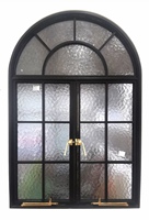 Porte en acier et verre de conception française de luxe sur mesure avec ouverture manuelle et surface finie pour villas