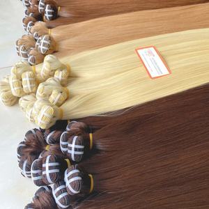 Trama de doble máquina marrón claro Paquete de cabello Remy vietnamita mano suave materia prima al por mayor - Product Image 3