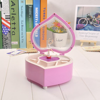 Boîte à musique élégante ovale en cristal avec manivelle, durée de 30 secondes, couleur et logo personnalisables, boîte de rangement rotative dansante pour filles