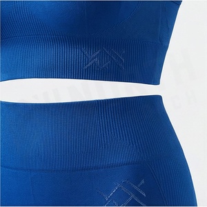 Conjunto de yoga sin costuras para mujer, 2 piezas, leggings de cintura alta, sujetador deportivo con espalda cruzada, azul liso - Product Image 5