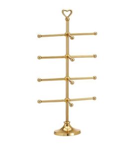 Minimalist Brass Jewelry Stand With Three Tiers And Oval Base For Bedroom Decor - Product Image 3