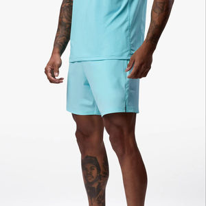 กางเกงขาสั้นกีฬาผู้ชายสีฟ้า ผ้าโพลีเอสเตอร์ 100% ระบายอากาศ แห้งเร็ว เป็นมิตรกับสิ่งแวดล้อม เหมาะสำหรับออกกำลังกาย วิ่ง และสวมใส่ลำลอง - Product Image 1
