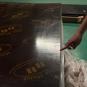 Prix Usine Contreplaqué Mélaminé 12-15-18mm Réutilisable 10 Fois Noyau Caoutchouc A2 E1 pour Matériaux de Construction Extérieurs Vietnam - Product Image 1