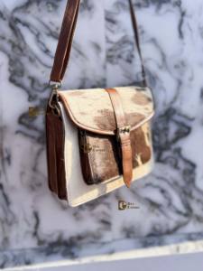 Sac à bandoulière élégant et décontracté en cuir de vachette véritable pour femme, avec fermeture éclair à pompon, imperméable et léger - Product Image 3