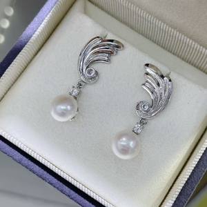 Boucles d'oreilles pendantes exquises à motif d'oiseaux jumeaux, asymétriques, brossées, en argent pur S925, ailes d'ange élégantes - Product Image 2