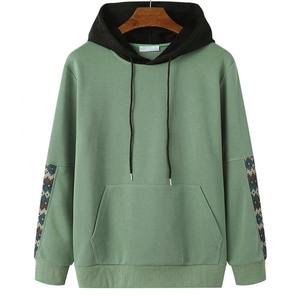 Sweat-shirt à capuche unisexe surdimensionné vert uni en coton tricoté, pull décontracté avec poche et manches à motifs, personnalisable - Product Image 1