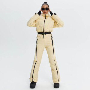 Custom <b>Women</b> Cream Beige One Piece Ski Suit Puffed Chest Quilted Black Belt Waist <b>Snowsuit</b> <b>Women</b> Slim Fit Jumpsuit Waterproof - Product Image 1