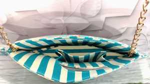 Make a bold fashion statement with this handcrafted fish-shaped shoulder bag, designed to combine artistic with everyday - Product Image 3