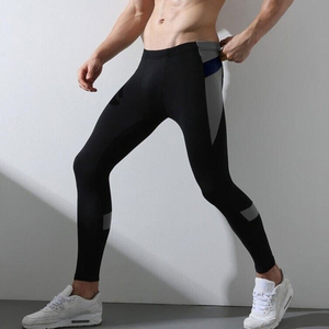 Men's <b>Black</b> Full Length Compression <b>Leggings</b> <b>High</b> <b>Waist</b> Seamless Four-Way Stretch Color Blocking Yoga Pants - Product Image 1
