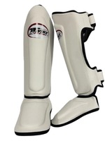 Protège-tibias professionnels légers en cuir de vachette véritable 100 % personnalisables avec fermeture auto-agrippante en tissu sportif