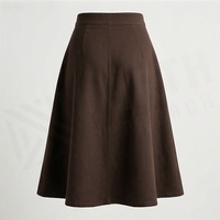 Jupe élégante pour femme, taille haute, coupe évasée, longueur genou, couleur unie, boutonnée devant, en tissu de laine, confortable, à porter toute l'année