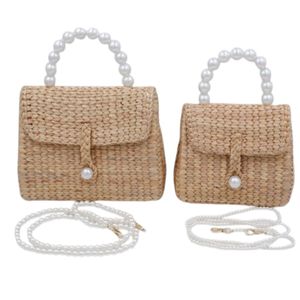 Sacs à main en jacinthe d'eau avec poignée en perles (modèle Maman et moi) - Product Image 1