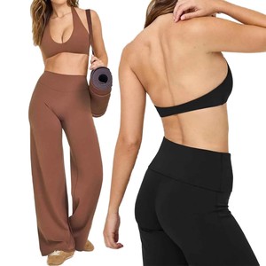 Nuevo Conjunto de Yoga de Dos Piezas para Mujer, Otoño-Invierno, de un Solo Hombro, Ajustado, Manga Larga, Color Sólido, Antibacteriano, con Pantalones Anchos Ligeramente Acampanados - Product Image 1