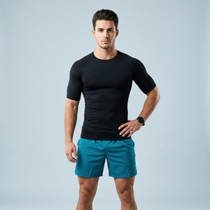 T-shirt de compression noir à manches courtes pour homme, coupe ajustée, séchage rapide, vêtement de sport athlétique, col rond, haut de performance tricoté - Product Image 1