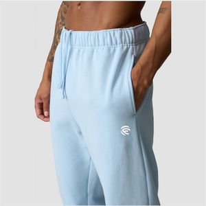 Pantalones deportivos de algodón orgánico Arctic Blue con bolsillos laterales abiertos, cintura ajustable con cordón, longitud completa con puños en las piernas. - Product Image 1