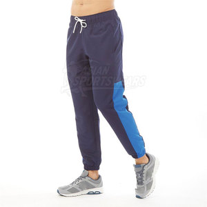 Pantalones Cortavientos Clásicos para Hombre con Dobladillo Ajustable, Cómodos y Resistentes al Viento, Ideales para Correr - Product Image 4