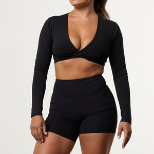 Top Corto Deportivo Negro de Manga Larga Cruzada para Mujer, Tejido de Punto, Spandex, Poliéster, Transpirable, Diseño Sólido, Cintura Alta - Product Image 1