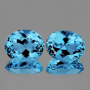 พลอยโทแพซสีฟ้าธรรมชาติทรงรีจากบราซิล คุณภาพไร้ตำหนิ VVS ความเงางามสูงสุด สำหรับขายส่งเครื่องประดับ - Product Image 1