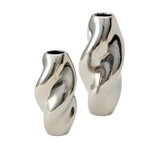 Conjunto de florero decorativo personalizado de metal con forma retorcida, decoración del hogar, nuevo diseño, Plata pulida - Product Image 1