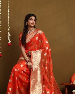 Sari en soie mélangée tissée à pompons orange pour femme KV avec chemisier non cousu - Product Image 1