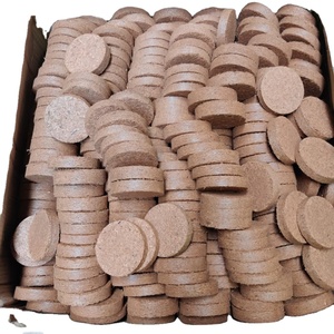 Un disco de fibra de coco biodegradable y ecológico, un producto para germinación de semillas sin tierra para jardinería doméstica. - Product Image 6