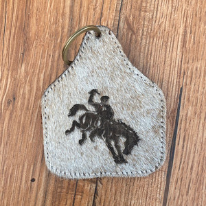 El más nuevo llavero de lujo en relieve con láser de piel de vaca OEM personalizado, Mini llavero personalizado de cuero genuino con pelo occidental para promoción - Product Image 4