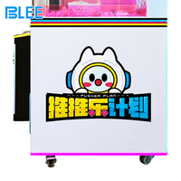 Machine de jeu d'arcade à pousser les objets, distributeur de prix à monnayeur avec joystick et lumières LED pour centres commerciaux et parcs d'attractions