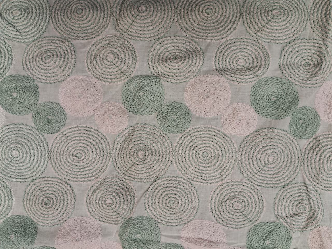 White base with pink and light green embroidery