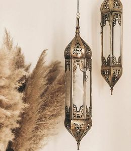 Lanterne marocaine artistique en fer pour l'éclairage des bougies, créant des motifs d'ombres décoratifs et une lueur atmosphérique chaleureuse - Product Image 6