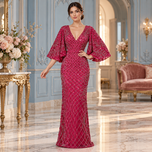 Robe de soirée rose fuchsia brodée avec des manches bouffantes évasées |   Robe de soirée longue à col en V avec détails en sequins - Product Image 2