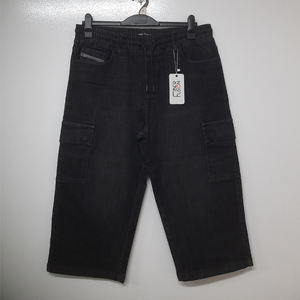 Pantalones cortos de mezclilla resistentes para hombre, hechos con mezclilla de algodón premium, ajuste holgado y cómodo, perfectos para aventuras, camping y estilo urbano. - Product Image 1