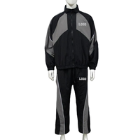 Ensemble de survêtement à capuche avec logo personnalisé et blocs de couleur pour homme – Veste coupe-vent à fermeture éclair intégrale et pantalon – Tenue de sport légère pour l'entraînement – OEM