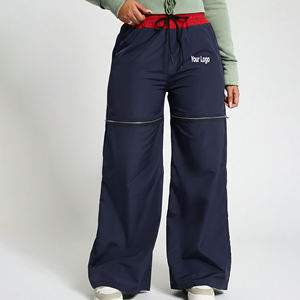 Pantalon de jogging tendance OEM/ODM de haute qualité 100 % nylon coupe-vent et imperméable à bas large avec logo personnalisé - Product Image 1